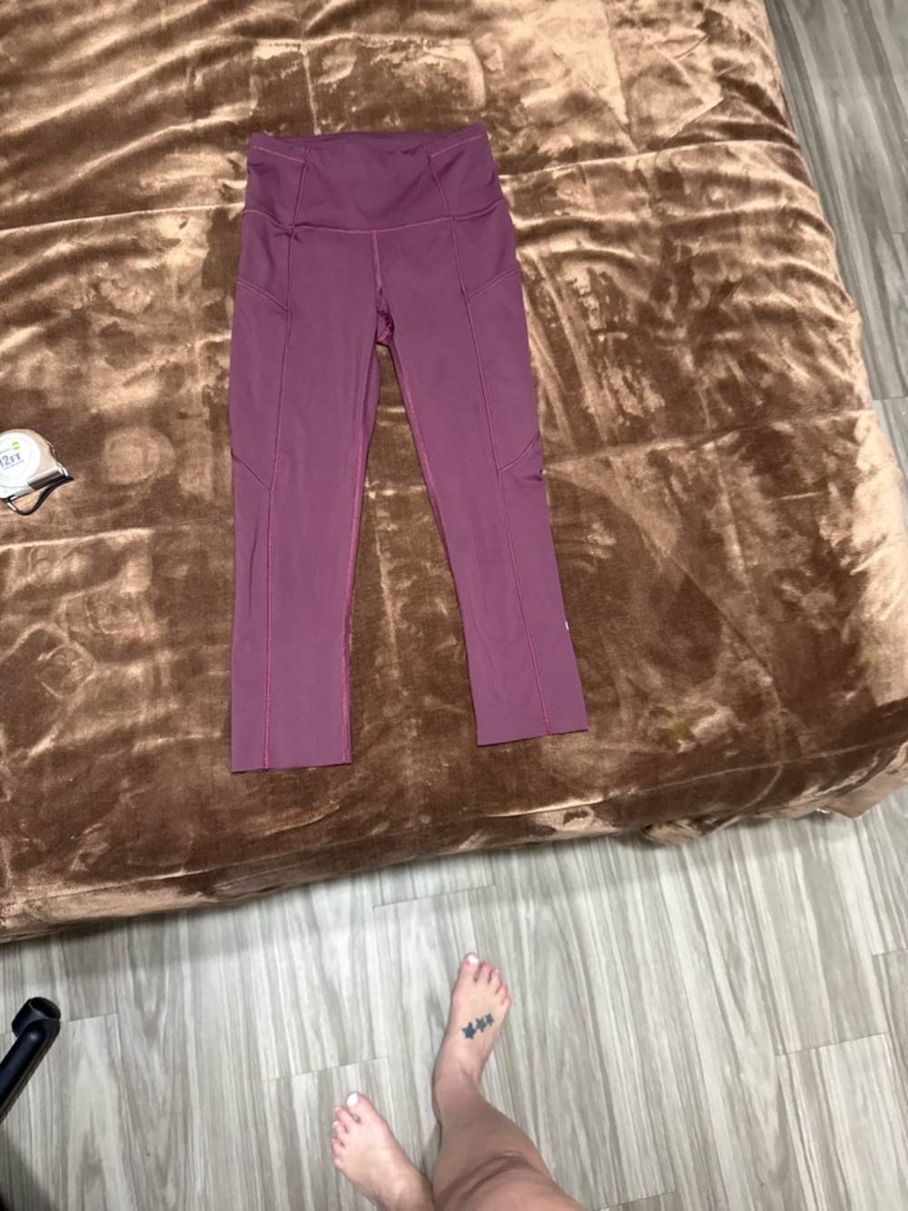 Woman’s size 2 Lululemon Plum/Mauve Leggings with pockets